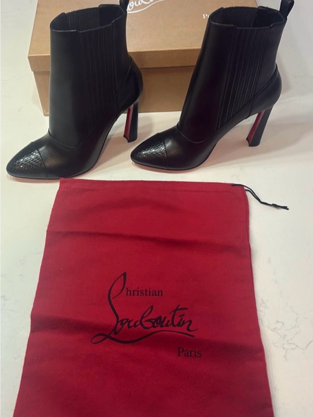 Christian Louboutin Black Leather Pointed Toe Ankle Booties with Red Sole